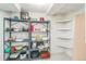 Shelving and storage solutions in a storage area or pantry at 2902 S Meade St, Denver, CO 80236