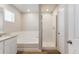Relaxing bathroom with double vanity, soaking tub, and a separate shower at 48195 Shetland Dr, Bennett, CO 80102