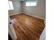 Bedroom with hardwood floors, neutral paint and natural light from a window at 1245 Yates St, Denver, CO 80204