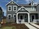 Beautiful townhome showcasing a well-manicured lawn and craftsman-style architecture at 15242 Detroit St, Thornton, CO 80602