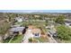 Aerial view of a home highlighting the expansive lot, landscaping, and neighborhood at 5491 Lowell Blvd, Denver, CO 80221