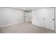 A finished basement with ample closet space and access to other rooms at 5491 Lowell Blvd, Denver, CO 80221