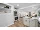 Modern kitchen with updated appliances, ample cabinet space, and an open layout at 5491 Lowell Blvd, Denver, CO 80221