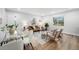 Inviting living room showcasing comfortable seating, large windows and modern décor at 5491 Lowell Blvd, Denver, CO 80221