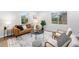Cozy living room featuring ample seating, natural light, and stylish design at 5491 Lowell Blvd, Denver, CO 80221