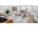 Comfortable living area blending living and dining spaces with modern accents at 5491 Lowell Blvd, Denver, CO 80221
