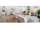 Modern living area showcasing dining and living spaces with updated décor at 5491 Lowell Blvd, Denver, CO 80221