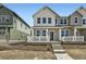 Charming two-story home with a welcoming front porch and a modern design at 708 N Bently St, Watkins, CO 80137