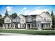 Charming row of newly built townhomes featuring eye-catching exterior design and professionally landscaped yards at 708 N Bently St, Watkins, CO 80137