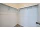 Walk-in closet with built-in shelving providing ample storage space at 708 N Bently St, Watkins, CO 80137