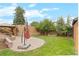 Landscaped backyard with patio, pergola, and garden at 3050 Bellaire St, Denver, CO 80207