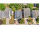 Aerial shot of neighborhood homes showing the roof and driveway of each property at 4857 Tarcoola Ln, Highlands Ranch, CO 80130