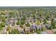 A vast residential neighborhood showcasing tree-lined streets and single-Gathering houses at 4857 Tarcoola Ln, Highlands Ranch, CO 80130