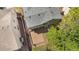 Aerial view of a backyard, featuring a wooden deck attached to the house at 4857 Tarcoola Ln, Highlands Ranch, CO 80130