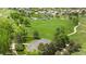 Neighborhood park with a playground, basketball court, green space, and walking paths at 4857 Tarcoola Ln, Highlands Ranch, CO 80130