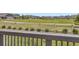 Relaxing back porch view overlooking open green space in residential area at 515 176Th Ave, Broomfield, CO 80023