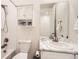 Bathroom features a shower-tub combo with white tile, a modern vanity, and ample storage with a mirrored cabinet at 515 176Th Ave, Broomfield, CO 80023