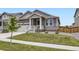 Charming home featuring a two-car garage and well-maintained front yard at 515 176Th Ave, Broomfield, CO 80023