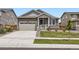 Charming single-Gathering home featuring a manicured lawn and inviting covered entryway at 515 176Th Ave, Broomfield, CO 80023