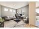 Inviting office space featuring a comfortable sofa and functional desk setup for an ideal work-from-home environment at 515 176Th Ave, Broomfield, CO 80023