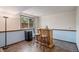Finished basement wet bar with seating at 16724 E Hialeah Ave, Centennial, CO 80015