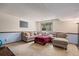 Finished basement has large sectional couch and lots of room at 16724 E Hialeah Ave, Centennial, CO 80015