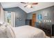 This bedroom is spacious with neutral carpet and a vaulted ceiling at 16724 E Hialeah Ave, Centennial, CO 80015