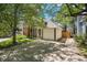 This home offers an attached garage and well-maintained lawn at 16724 E Hialeah Ave, Centennial, CO 80015