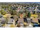 Aerial view of a home in a residential neighborhood with mature trees at 6368 S Emporia Cir, Englewood, CO 80111