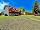 Expansive backyard featuring a wooden deck and fence, offering ample space for outdoor activities and privacy at 8820 Cody St, Broomfield, CO 80021