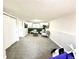 Finished basement offers a relaxing living space with cozy seating, a TV, and ample room for entertaining at 8820 Cody St, Broomfield, CO 80021