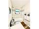 Well-appointed bathroom featuring a tiled shower-tub, modern fixtures, and tasteful decor for a clean aesthetic at 8820 Cody St, Broomfield, CO 80021