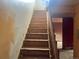 View of uncarpeted staircase leading to second level at 1413 Centennial Dr, Longmont, CO 80501