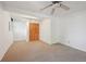 Versatile bonus room with ceiling fan and closet, ready for your personal touch at 1370 S Hudson St, Denver, CO 80222