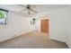 Spacious bonus room features a ceiling fan, and closet, perfect for flexible living at 1370 S Hudson St, Denver, CO 80222