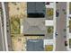 An aerial view showcasing the home's roof and surrounding landscaping, including the driveway and street at 2226 Monte Vista St, Fort Lupton, CO 80621