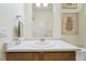 Well-lit bathroom featuring a vanity with white countertop, and a neutral color scheme at 2226 Monte Vista St, Fort Lupton, CO 80621