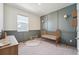 Charming Bedroom with gray wainscoting, decor, and a classic gold crib at 2226 Monte Vista St, Fort Lupton, CO 80621