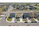 A neighborhood featuring similar homes, each with well-kept lawns, driveways, and attached garages at 2226 Monte Vista St, Fort Lupton, CO 80621