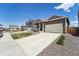 Inviting home with an attached two-car garage, complemented by a neat landscape and a welcoming front porch at 2226 Monte Vista St, Fort Lupton, CO 80621