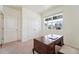 Bright home office with classic wood desk, closet and natural light at 2226 Monte Vista St, Fort Lupton, CO 80621