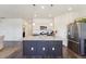Spacious kitchen with a granite island, stainless steel appliances, and open layout at 2226 Monte Vista St, Fort Lupton, CO 80621