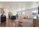 Spacious open-concept layout with modern kitchen, dining area, and a relaxing living space at 2226 Monte Vista St, Fort Lupton, CO 80621