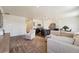 Inviting open-concept space blending living, dining, and kitchen areas for modern living at 2226 Monte Vista St, Fort Lupton, CO 80621