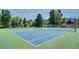 Well-maintained tennis courts with blue playing surfaces, perfect for recreational play at 5050 W 102 Ave, Westminster, CO 80031