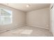 Bedroom with neutral carpeting and a window with blinds at 579 Jewel St, Brighton, CO 80603