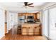 Spacious eat-in kitchen featuring wooden cabinets and stainless steel appliances at 8856 W Prentice Ave, Littleton, CO 80123