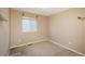 Bedroom featuring neutral decor, carpeting, and a window offering natural light at 9781 Dunning Cir, Highlands Ranch, CO 80129
