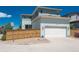 Two-story home with garage and fenced yard at 9781 Dunning Cir, Highlands Ranch, CO 80129