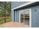 Charming deck with sliding glass door offering seamless indoor-outdoor living, showcasing the home's inviting exterior at 1699 S Trenton St # 174, Denver, CO 80231